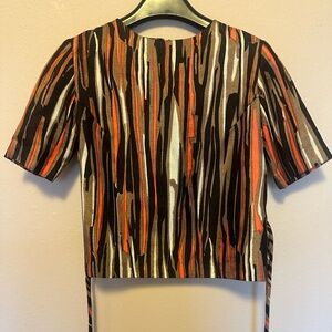 Vintage 1960s silk blouse or shell with tribal/tiki pattern